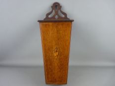 A VICTORIAN MAHOGANY LIDDED CANDLE BOX with pierced crest and inlaid shell motif, 49 cms high
