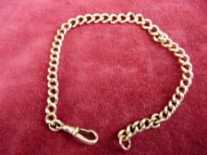 A NINE CARAT GOLD ALBERT of graduated links with swivel, 18.9 grms