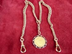 Correction: Half sovereign not full A FINE NINE CARAT GOLD DOUBLE ALBERT OF GRADUATED LINKS with twi