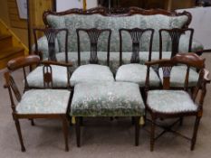 AN EIGHT PIECE VICTORIAN & LATER HARLEQUIN SALON SUITE of carved back couch, four pierced splat side