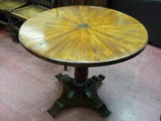 A CIRCULAR TILT TOP PEDESTAL TABLE with quatrefoil base, the 91.5 cms diameter reduced top with