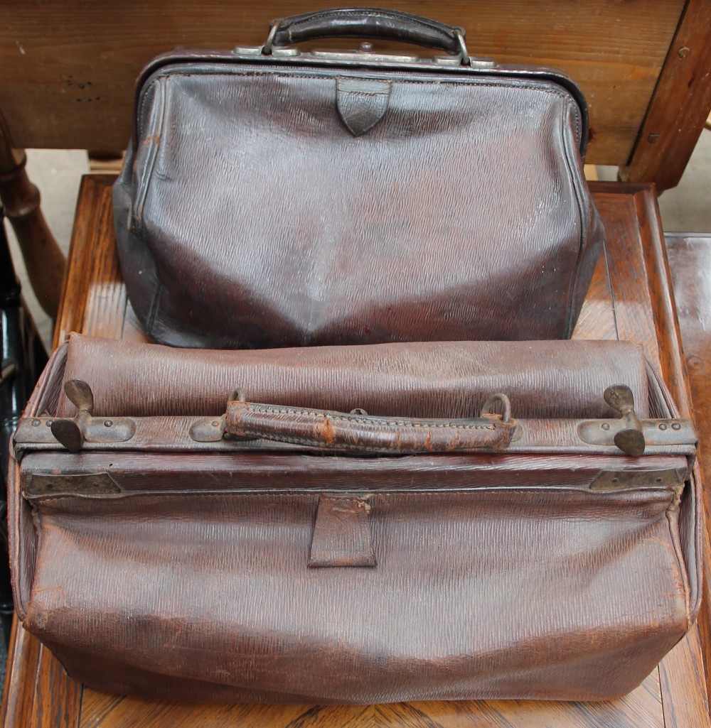Two brown leather doctors type bags