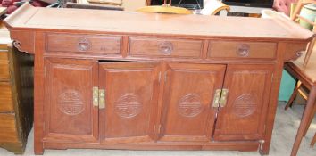 A modern Chinese sideboard with three drawers and four cupboards