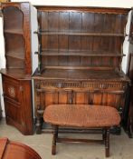A 20th century oak dresser together with a corner cupboard and a copper topped coffee table