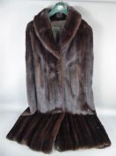 A Lady's Revillon Black Mink Cloak.