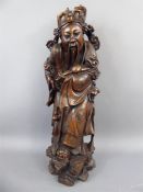 An 18th to 19th Century Oriental Figure of a Man.