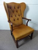 An Antique Mahogany Studded High Back Elbow Chair.