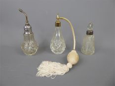 Three Cut Glass Perfume Bottles.