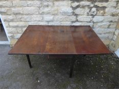 A Georgian Mahogany Drop-Leaf Table