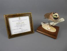 A Limited Edition Royal Worcester Bird Figurine.