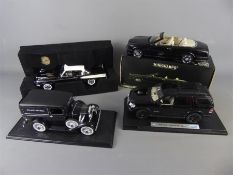 Three 1:18 Die-cast Model Cars.