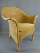 Two Cane Conservatory Chairs.