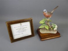 A Limited Edition Royal Worcester Bird Figurine.