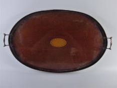 An Edwardian Mahogany Oval Butlers Tray