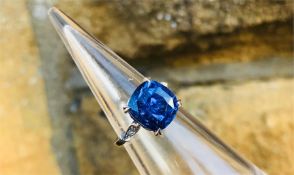 A Vivid Blue to Purple Art Deco-Style 9.15ct Colour-Change Natural Ceylon Sapphire and Diamond Ring