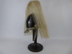 A Metal Helmet with the inscription 