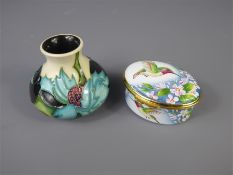 A Moorcroft Small Squat Vase, 'Sea Holly' Pattern