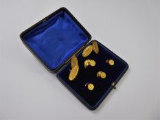 A Gentleman's Pair of 9 ct Gold Lozenge Cuff-links and Dress Studs