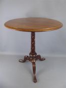 An Antique Round Oak Lamp/Wine Table