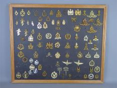 A Carded Display of Military Cap Badges