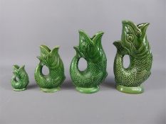 Four Dartmouth Devon Pottery Glug Jugs