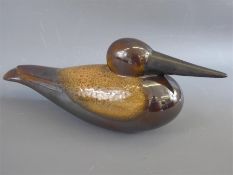 A Stoneware Brown Glazed Statuette