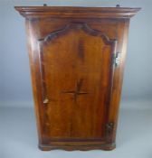 An Antique Mahogany Corner Cupboard
