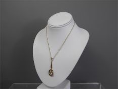 An Antique 9ct Gold Aquamarine Drop Pendant
