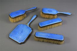 A Blue Enamel and Silver Brush Set.