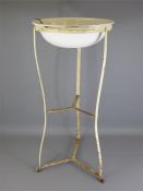 An Outdoor Enamel Wash Basin on Wrought Iron Stand