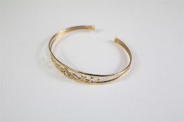A 9ct Gold Amethyst Bangle.