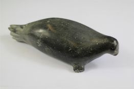 A Carved Eskimo Stone Sculpture of a Seal.