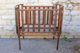 An Edwardian Mahogany Infant Cot