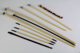A Pair of Bone and Enamel Finial Knitting Needles