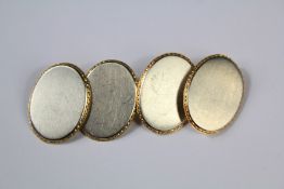 A Pair of Garrard & Co 18ct Gold and Platinum Cufflinks