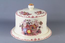 An Iron Stone Stilton Stand and Cover