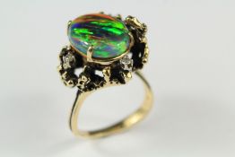 A Bespoke 14ct Yellow Gold Black Synthetic Stone and Diamond Ring