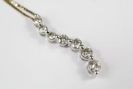 A 14ct White Gold Wave Pendant