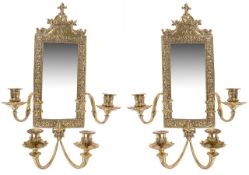 A pair of gilt brass four branch mirror back wall sconces, 20th century