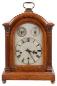A late 19th century oak cased bracket clock