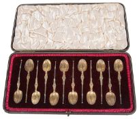 A suite of Edwardian silver gilt teaspoons, hallmarked London 1902