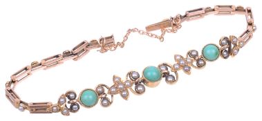 An attractive Edwardian turquoise and pearl set floral scroll bracelet