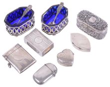 A selection of silver cruets, boxes, vestas and boxes
