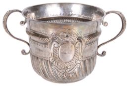 A Queen Anne Britannia silver porringer by John Cory, hallmarked London 1706