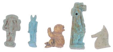 Three Egyptian turquoise glazed faience beads of figural and horse head form,