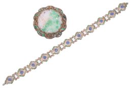 A Chinese silver filigree mounted carved jade brooch and filigree bracelet