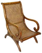 A William IV mahogany caned armchair,