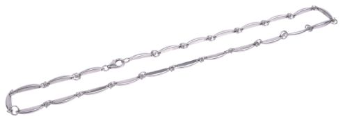 A contemporary diamond set silver collar necklace of modernist design,