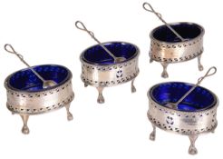 A set of four George III silver salts, hallmarked London 1783
