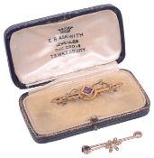 An Edwardian pearl set bar brooch and another,